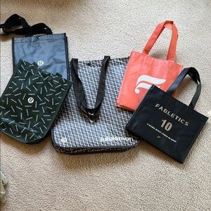 Bundle of 3 Lululemon and 2 Fabletics tote bags